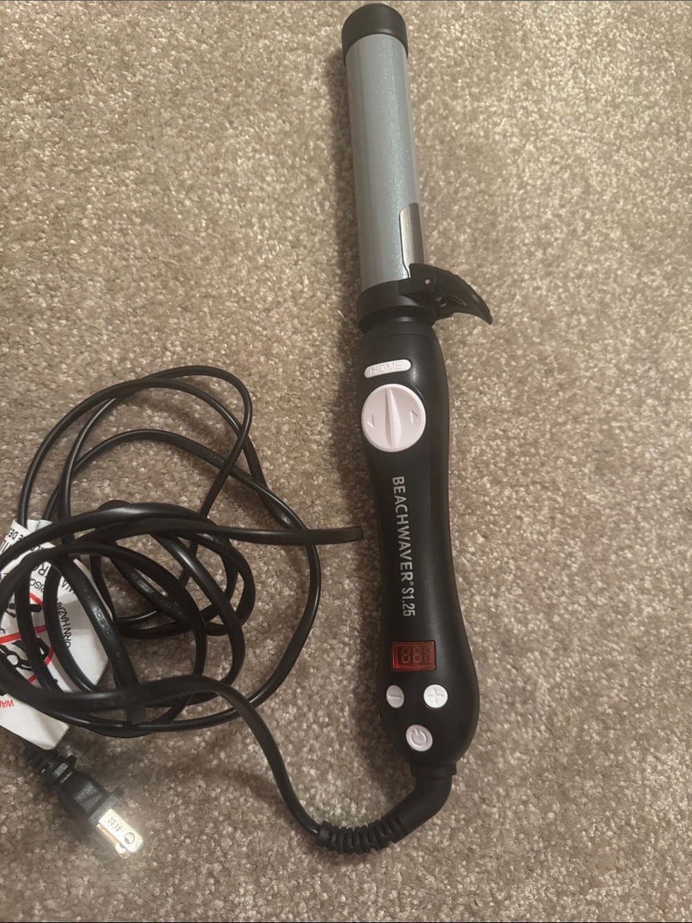 The Beachwaver Co. S1.25 Curling Iron in Black and Silver